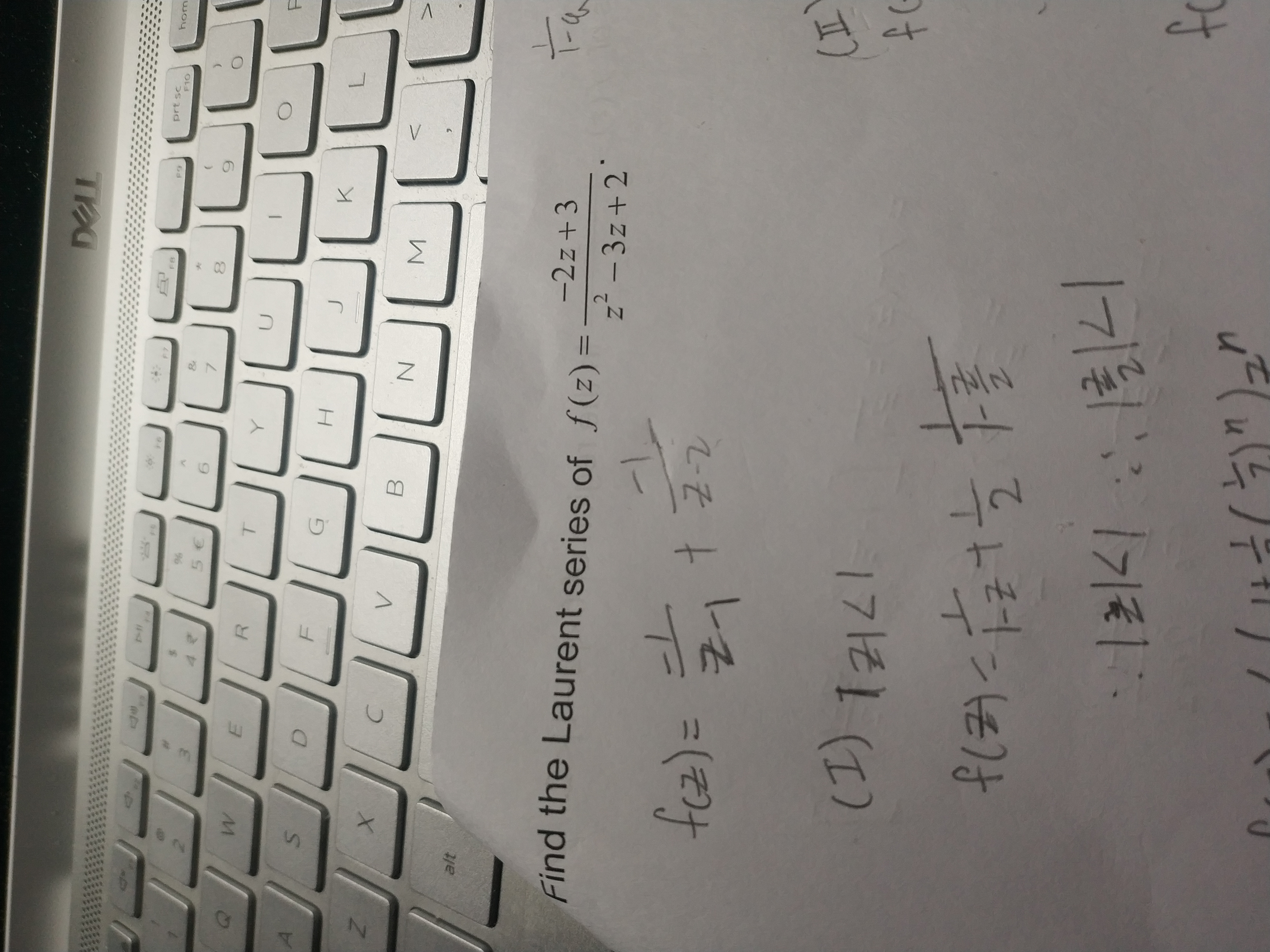 to
prt sc
hom
7.
C.
-2z+3
Find the Laurent series of f(z)=
2.
z´-3z+2
%3D
fcz)=
1712
가리 (1)
7).
2.
