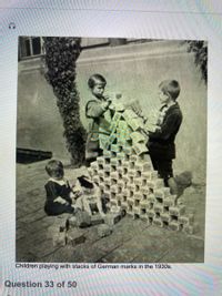 Children playing with stacks of German marks in the 1930s.
Question 33 of 50
