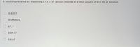 A solution prepared by dissolving 13.6 g of calcium chloride in a total volume of 201 mL of solution.
0.6097
0.000610
67.7
0.0677
0.610
