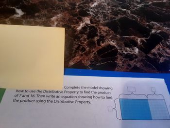 Complete the model showing
how to use the Distributive Property to find the product
of 7 and 16. Then write an equation showing how to find
the product using the Distributive Property.