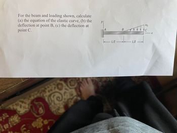 For the beam and loading shown, calculate
(a) the equation of the elastic curve, (b) the
deflection at point B, (c) the deflection at
point C.
A
| 12
B
L./2
Wo
IC
X