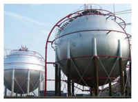 This image shows two large spherical storage tanks, commonly known as gasometers, used for storing gases such as natural gas or liquefied petroleum gas (LPG) at atmospheric pressure. 

**Description:**

- **Structure:** Each tank is spherical in shape, which is an ideal form for pressure vessels because it evenly distributes stress across its surface, minimizing the risk of leaks or structural failure.
  
- **Support:** Both tanks are supported by a series of vertical and diagonal legs, which provide stability and ensure that the tanks are elevated above the ground. This elevation aids in maintenance, inspection, and reduces the risk of corrosion from ground moisture.

- **Material:** The surface of the tanks appears metallic, suggesting they are made from steel or another durable metal designed to withstand the internal pressure of stored gases.

- **Safety Features:** Surrounding the tanks are railings and ladders, indicating safety measures for personnel performing maintenance or monitoring the contents.

These tanks are critical components in industries where large volumes of gas need to be stored safely and efficiently. Spherical gasometers are often used in petrochemical plants, refineries, and gas processing facilities due to their efficiency in space utilization and pressure management.