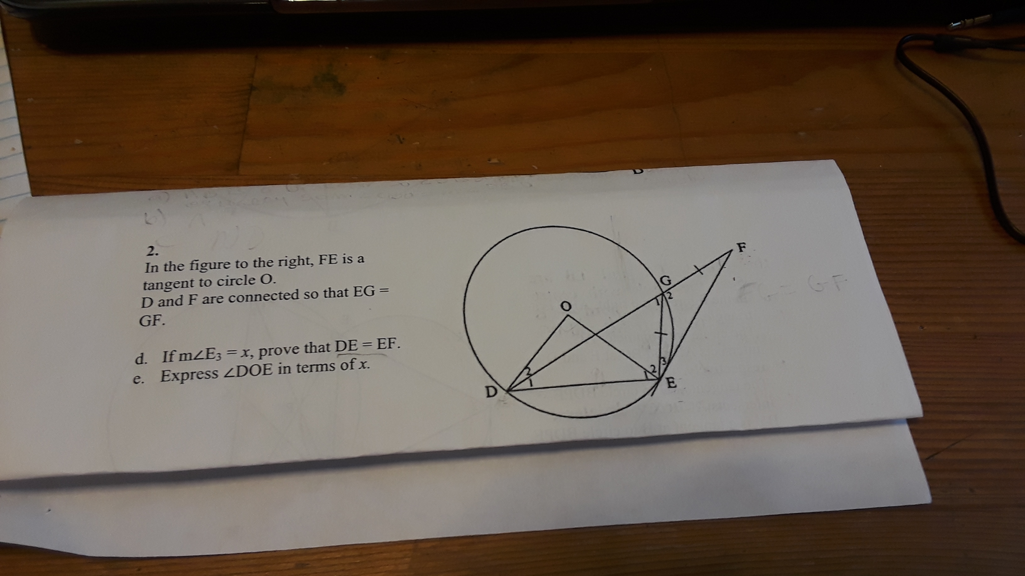 2.
In the figure to the right, FE is a
tangent to circle O.
D and F are connected so that EG =
GF.
d. If mZE3 =x, prove that DE = EF.
e. Express ZDOE in terms of x.
%3D
%3D
