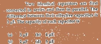 Answered: A Two Identical Capacitors Are First … | Bartleby