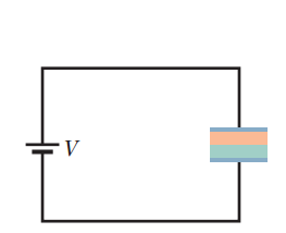 Chapter 25, Problem 65P, SSM In Fig.25-56, the parallel-plate capacitor of plate area 2.00  10-2 m2 is filled with two 